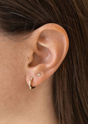 Clear CZ Baguette Huggie Hoops in Gold - Earrings